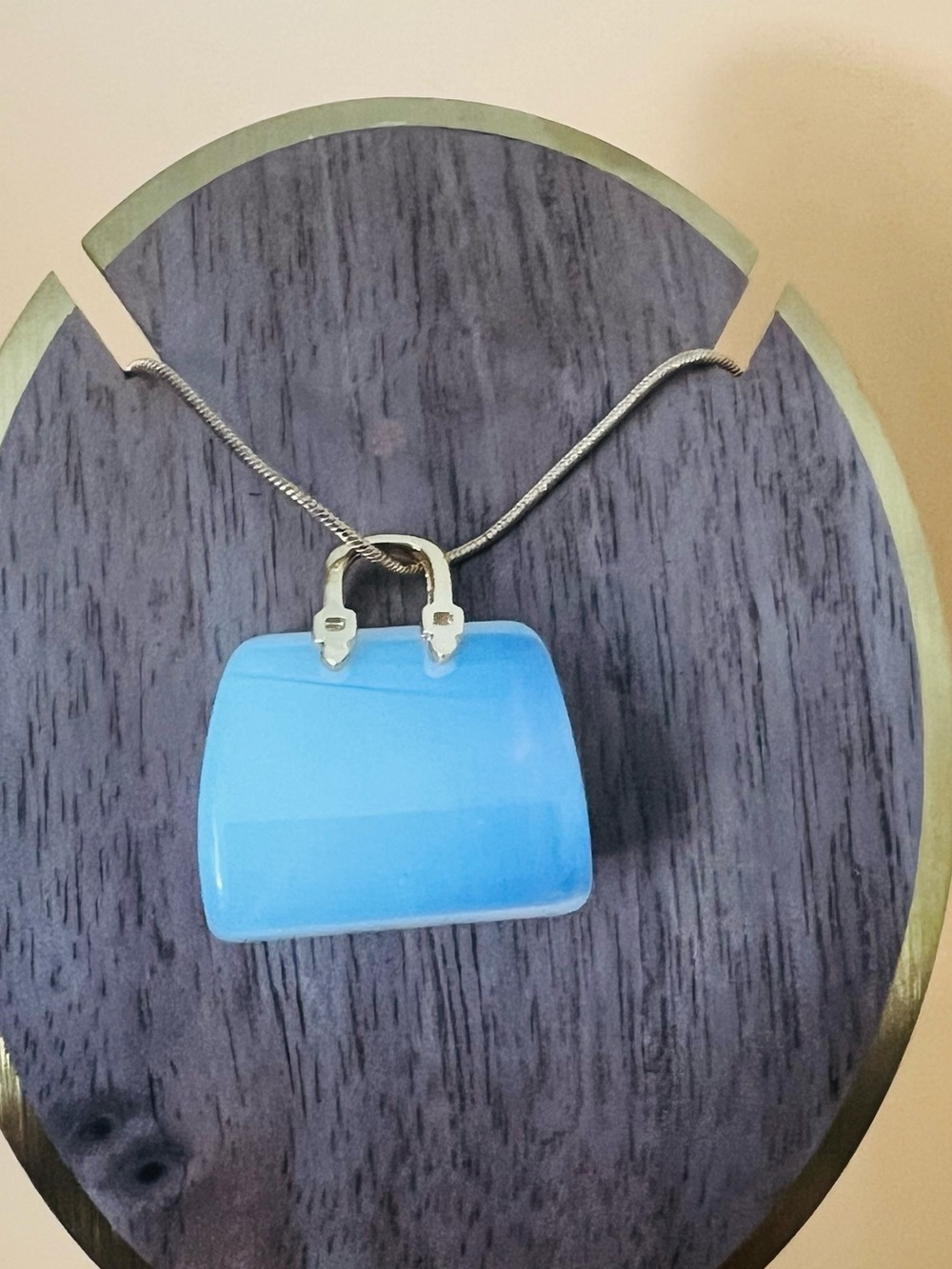 Semi precious Moonstone purse pendant plus a gold plated necklace